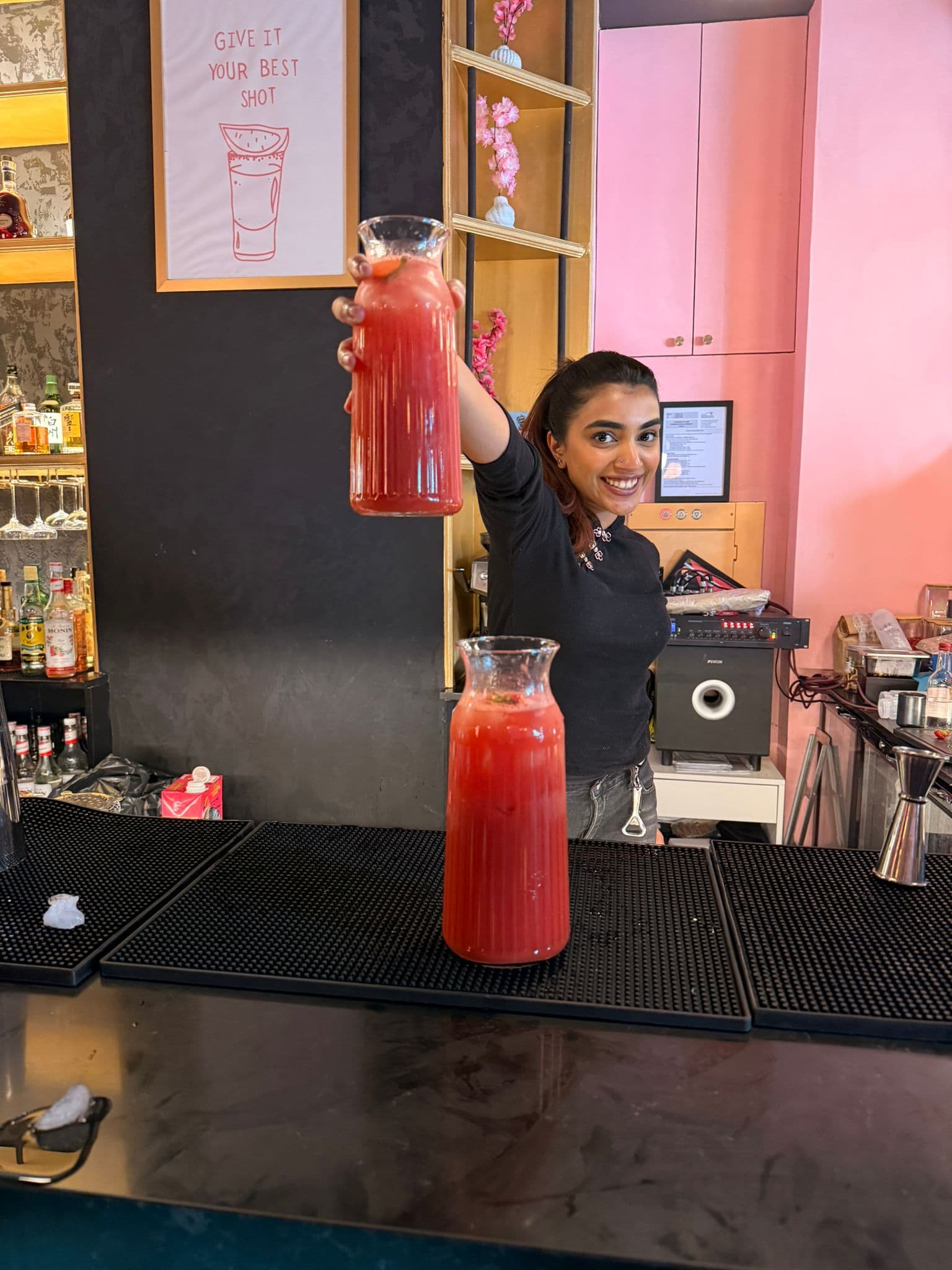 Signature brunch cocktails being poured